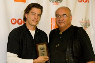 Roberto Munoz and Robbie Beniuk with award